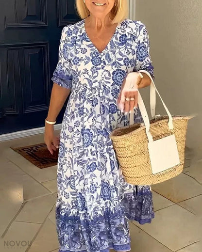 Luna - Rochie Elegantă cu Flori și Decupaj în V